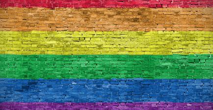 image of LGBT flag painted onto a wall